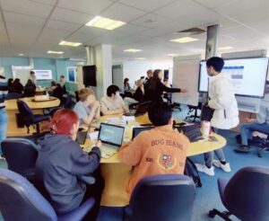 A photo of computer-equipped group desk in a teaching studio