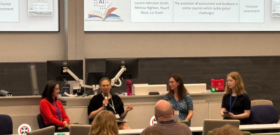 Photo of authors at panel presentation at the Conference