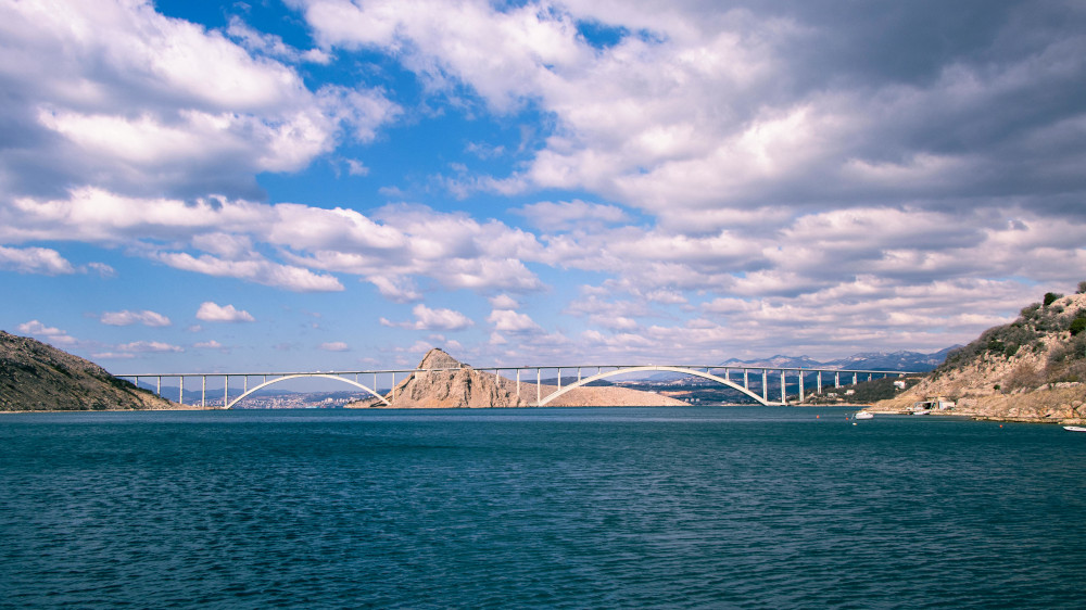 Photo of a bridge linking land together