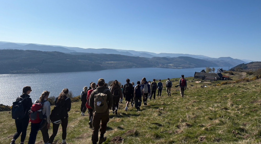 Students hiking in Bunloit overlooking Loch Ness, guided by representatives from Highlands Rewilding Ltd. Photo credit: Sarah Kline