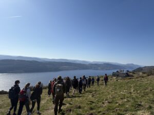 Students hiking in Bunloit overlooking Loch Ness, guided by representatives from Highlands Rewilding Ltd.