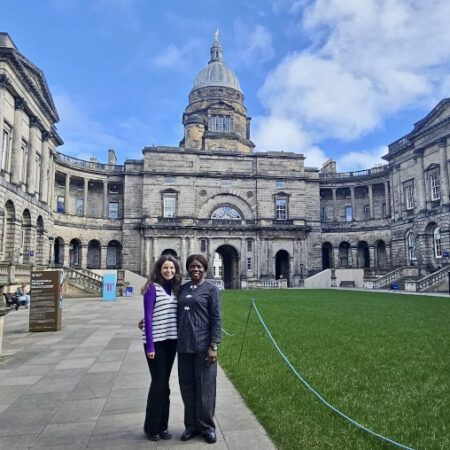 Picture of Laura and Labake outside Old College at the University of Edinburgh