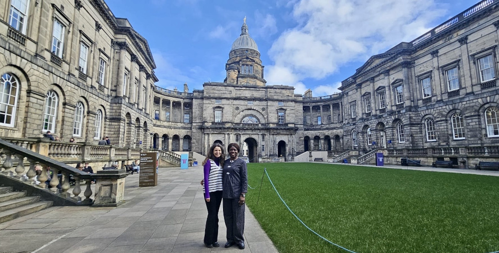 Picture of Laura and Labake outside Old College at the University of Edinburgh
