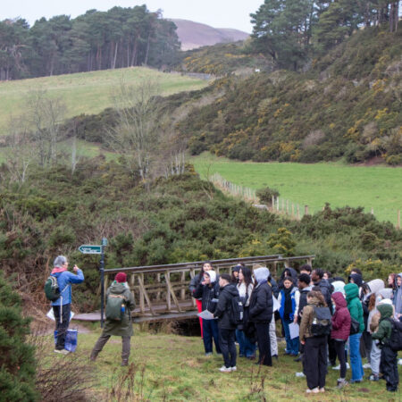 Students gathered by bridge in Pentalnds