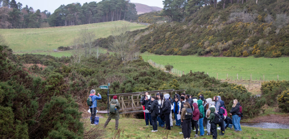 Students gathered by bridge in Pentalnds
