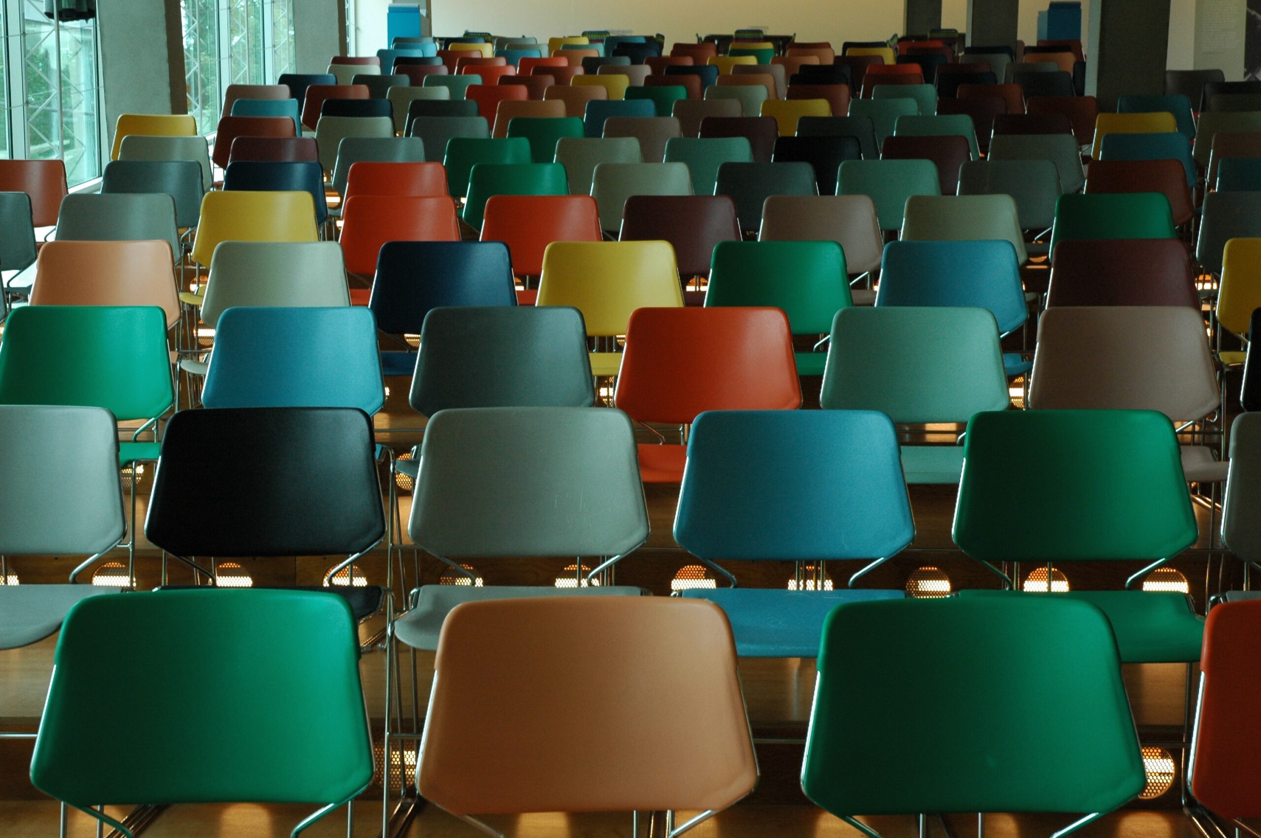 rows of colourful empty chairs