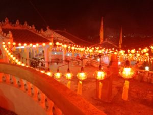 String of lights around temple in Malaysia at night