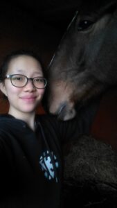 Vet student with horse