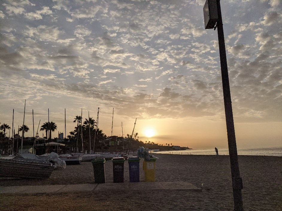 Sunset on beach in Malaga, Spain
