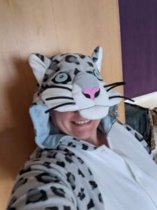 Student in snow leopard onesie