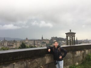 Student and Edinburgh buildings