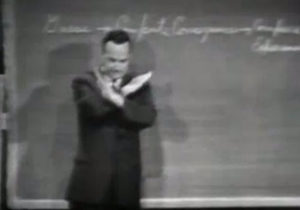 Richard Feynman presenting at Cornell University in 1964 (screengrab from You Tube clip)
