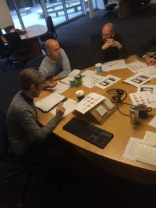 Session attendees discuss at a table