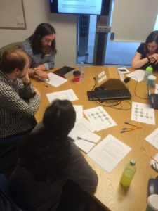 Session attendees discuss at a table