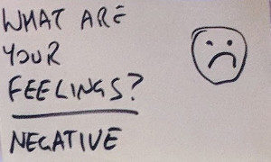 Sticky note: "What are your feelings? Negative"