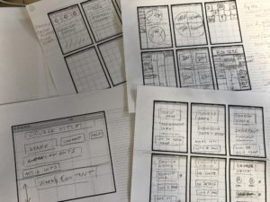 Lots of user interface sketches arranged on a desk