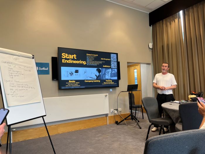Joe presenting in front of a slide that says Start Endineering