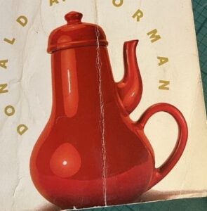 The cover of the Design of Everyday Things, featuring a coffeepot with a spout on the same side as the handle.