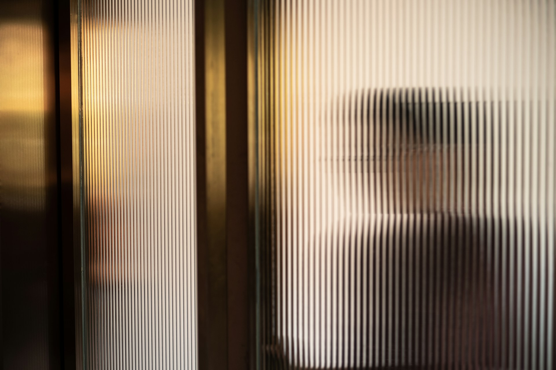 A person seen through privacy glass, unclear, they can't see in