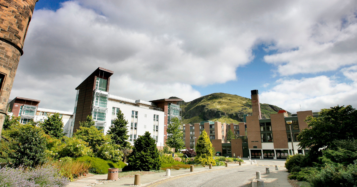 Pollock Halls - a variety of building styles with landscaped grounds, with Arthur's Seat - rising rising majestically in the background.