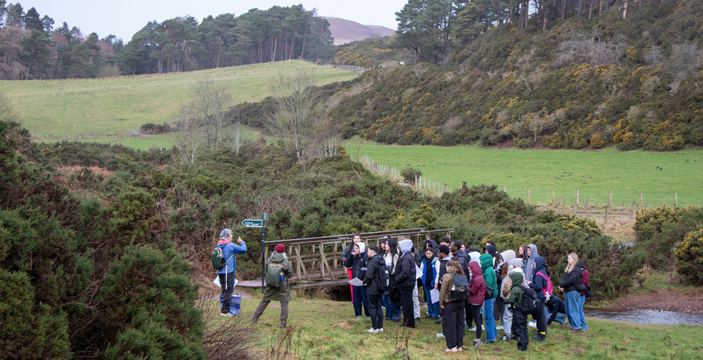 Students gathered by bridge in Pentalnds