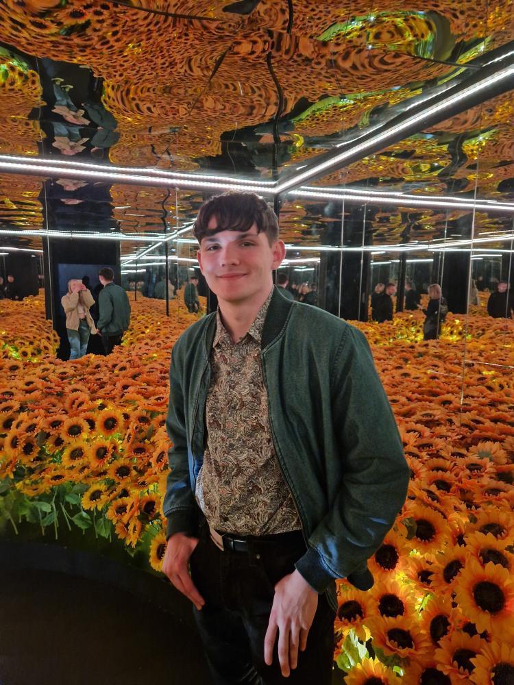 Declan amongst flowers